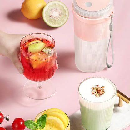Multi-function portable blender in blue, green, or pink with USB cable and detachable parts for juicing