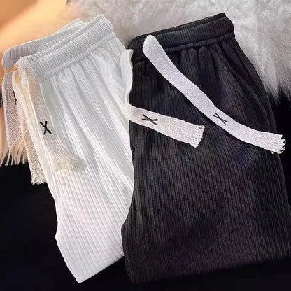 Men's cotton casual trousers with ice silk thread in loose straight cut, white or black colour options