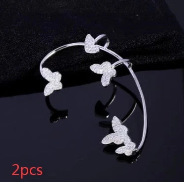 Elegant gold-plated butterfly ear cuffs with sparkling zircon accents, perfect for women's fashion and accessorizing