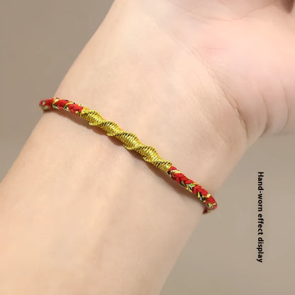 Woven eight-strand hand strap in zodiac-themed colours with flexible wire construction