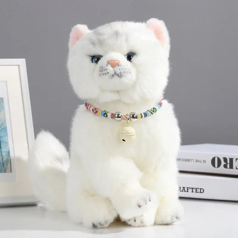 Coloured ethnic pattern adjustable dog collar with metal bell and reflective strip on a nylon strap.