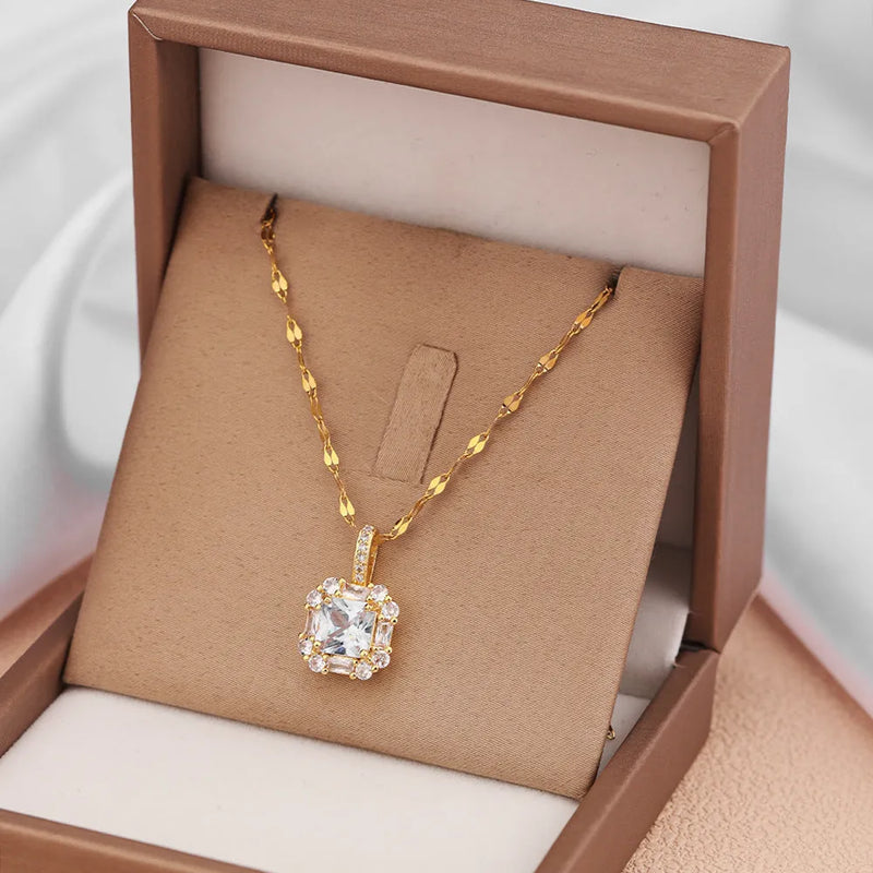 Women's titanium steel clavicle chain necklace with inlaid zircon quadrilateral gem pendant featuring electroplated T8052 gold finish on a water wave chain design for everyday wear and special occasion jewellery.