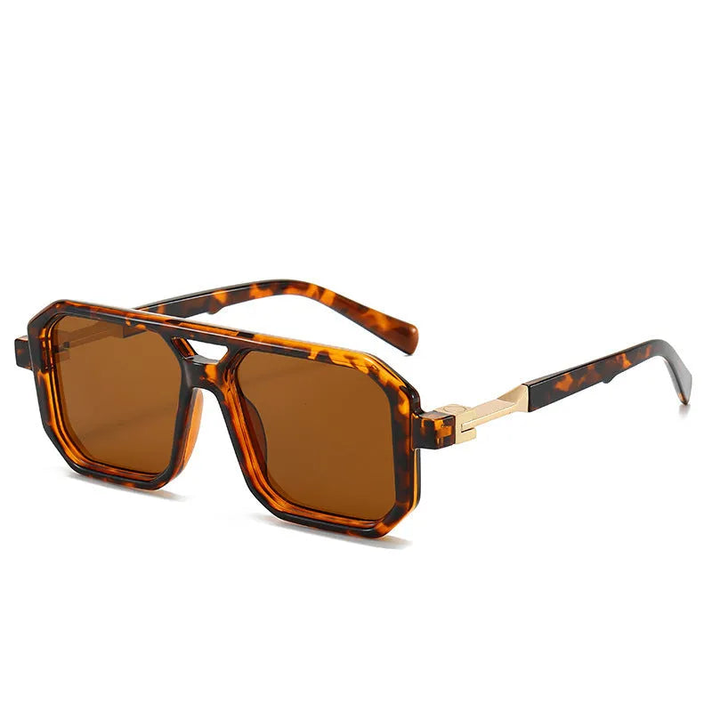 Retro style pilot sunglasses with a double beam metal frame and grey tinted lenses.