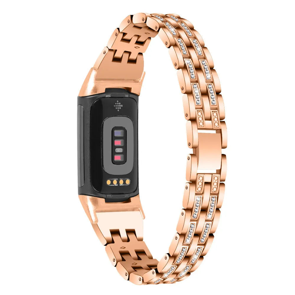 Diamond-patterned metal watch strap for Fitbit Charge 5 in rose gold colour.