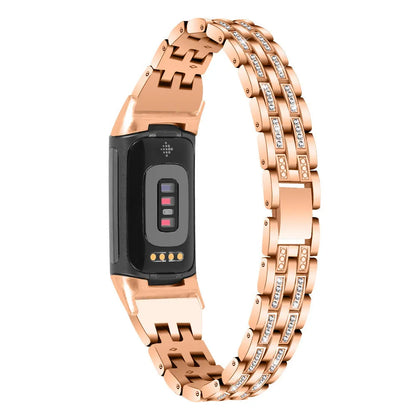Diamond-patterned metal watch strap for Fitbit Charge 5 in rose gold colour.