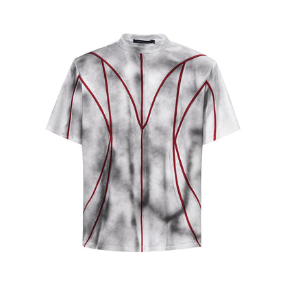 Padded shoulder short sleeve T-shirt with three-dimensional line patchwork detail on a mannequin.