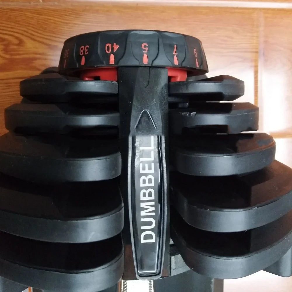 Black automatic adjustable dumbbell with dial weight selector showing 5kg to 25kg range