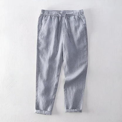 Men's straight linen trousers in four colour options showing mid waist and straight-leg cut