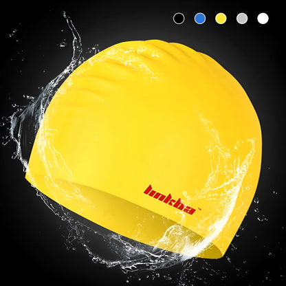 Silicone swimming cap with earmuffs in multiple colours showing letter pattern.