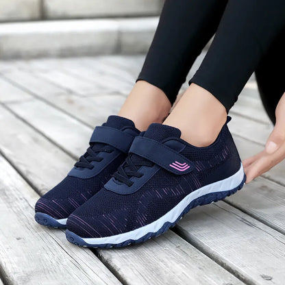 Women's gray purple casual shoes with mesh upper, wedge heel, and Velcro strap.