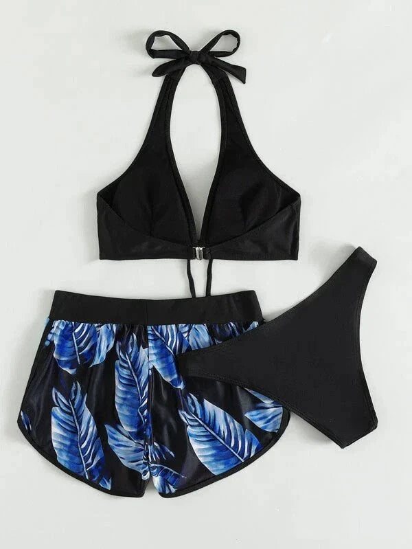 A stylish 3-piece leaf print bikini set with matching shorts, available in a variety of vibrant colors and patterns