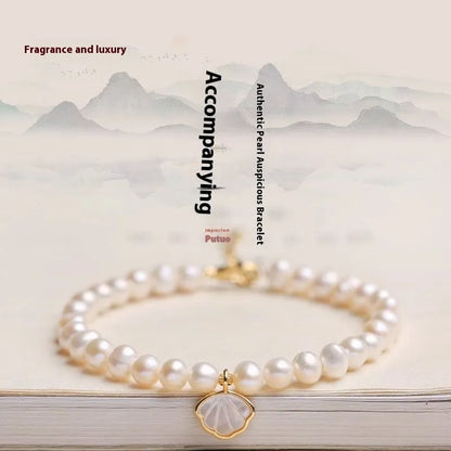 Freshwater pearl bracelet with fan-shaped pearl arrangement and alloy components