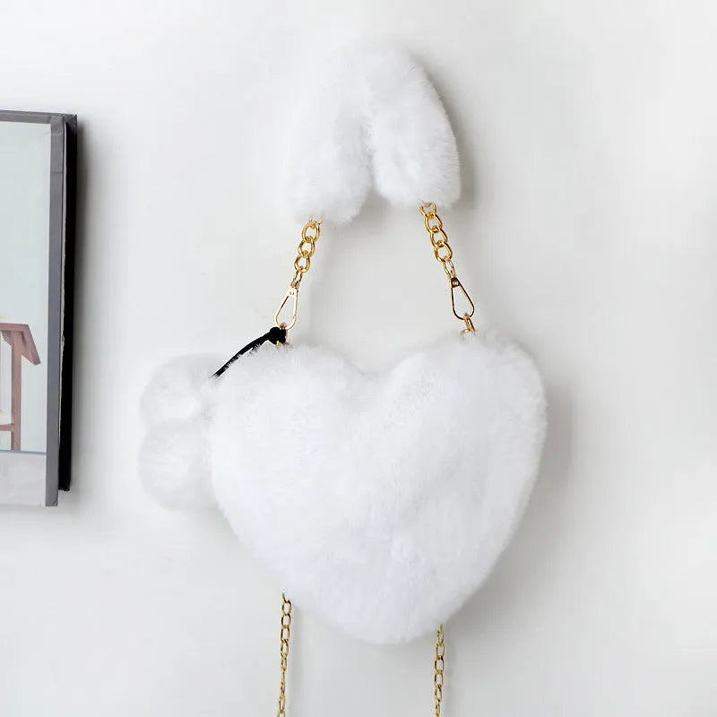Plush heart-shaped women's handbag in medium size with removable shoulder strap