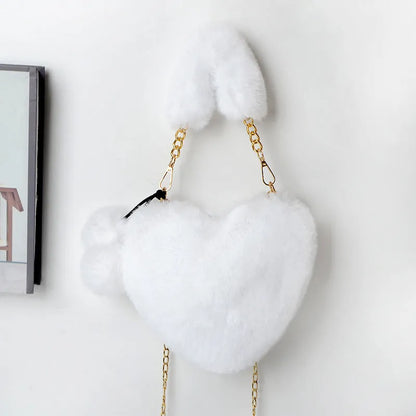 Plush heart-shaped women's handbag in medium size with removable shoulder strap