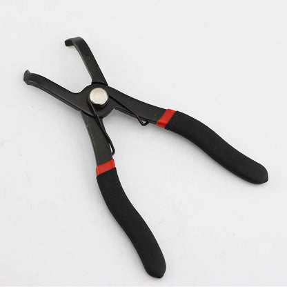 Red round nail removal pliers with PVC handles, jaws open, designed for extracting wire buckles and panel pins.
