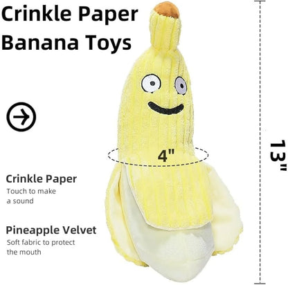 Yellow soft plush banana cat toy with green leaf, measuring 13 inches long, on a plain background.