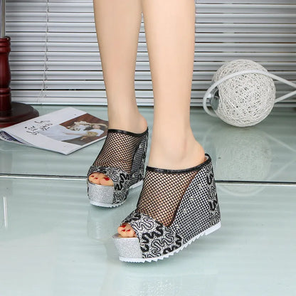 Korean-style platform flip flops with hollowed chunky heels and lace detailing on mesh upper