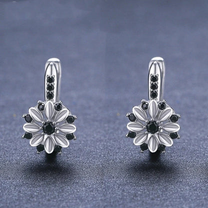 Copper flower ear clips with zircon inlays for women, black colour variant