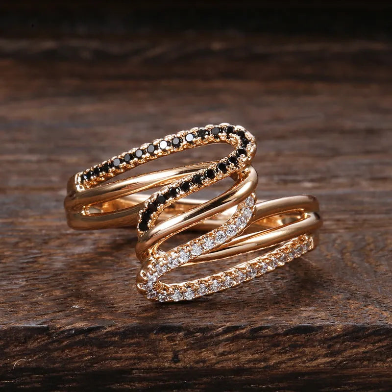 Women's electroplated copper ring with micro-inlaid zircon detailing, shown in WK2230 colour on a model's hand.