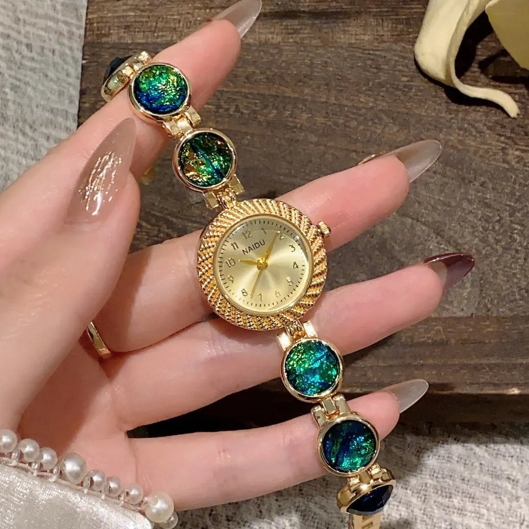 Women's quartz watch with 25mm round dial in a choice of six colours including Milky White, Dark Green, and Cherry Pink.