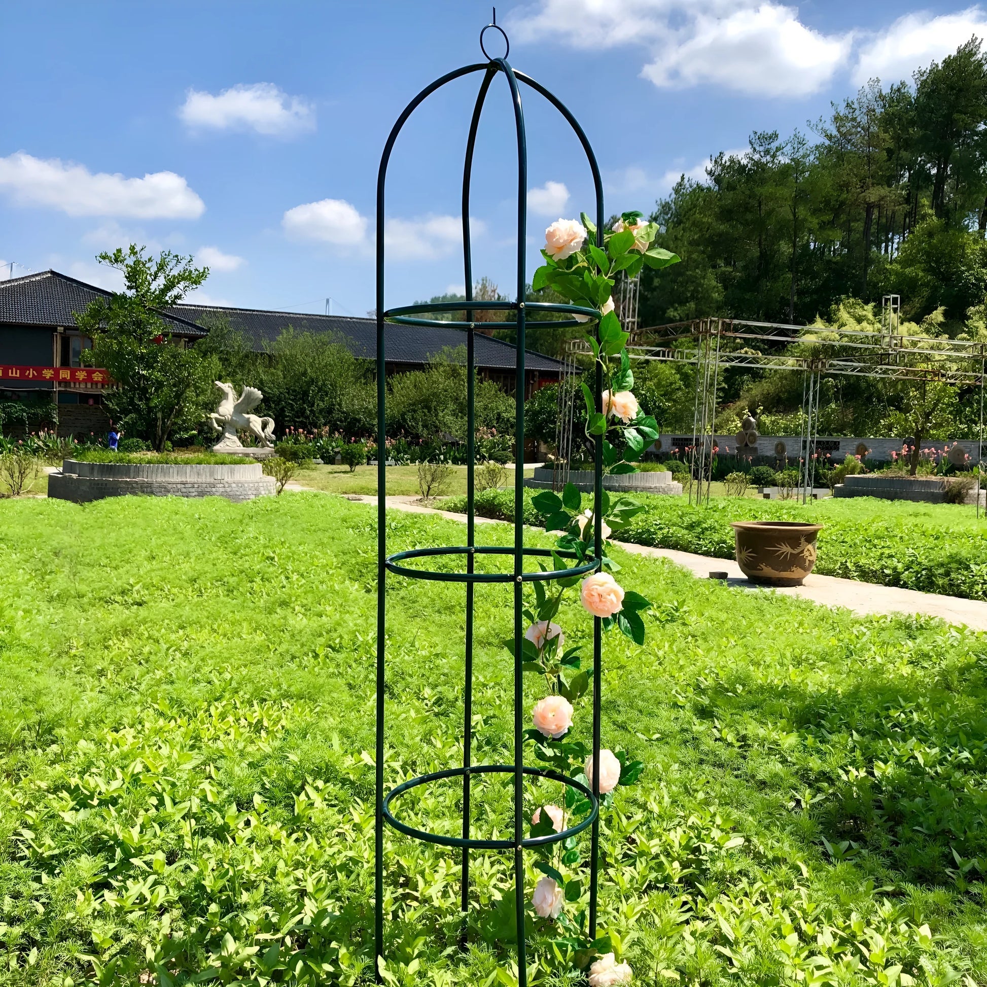 Dark green wrought iron plant climbing frame with lattice design measuring 188cm tall