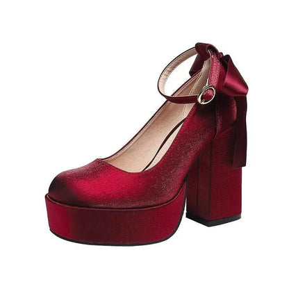 Women's waterproof wedding pumps with chunky heel in wine red colour featuring silk buckle detail