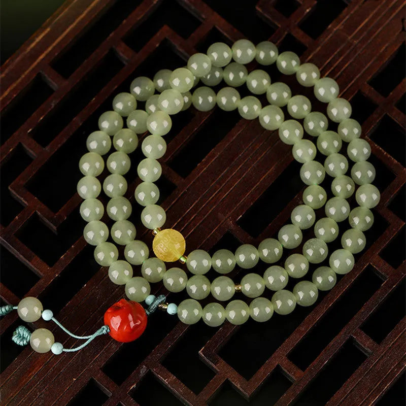 Pale blue Hetian jade bracelet with 6mm beads in three-circle design