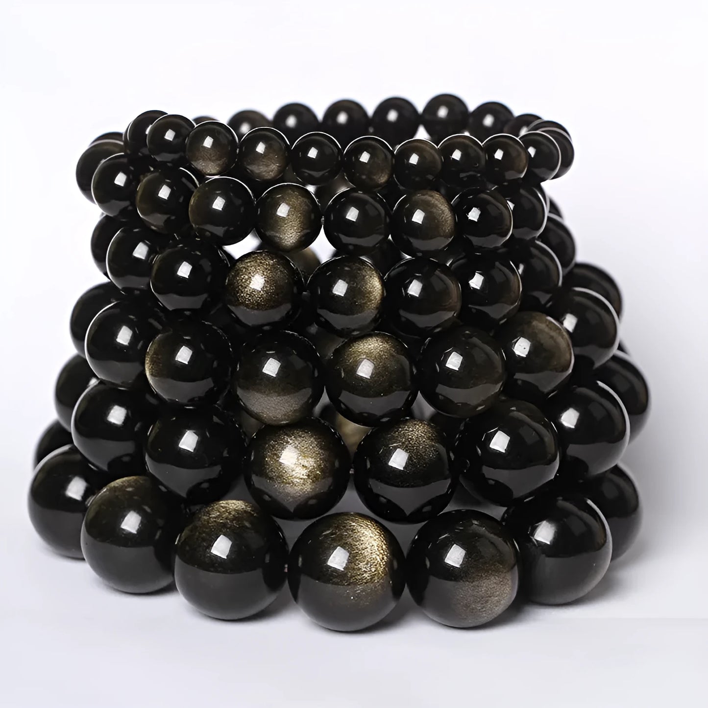 Hand-woven obsidian crystal bracelet showing round beads with ethnic styling in multiple colour options