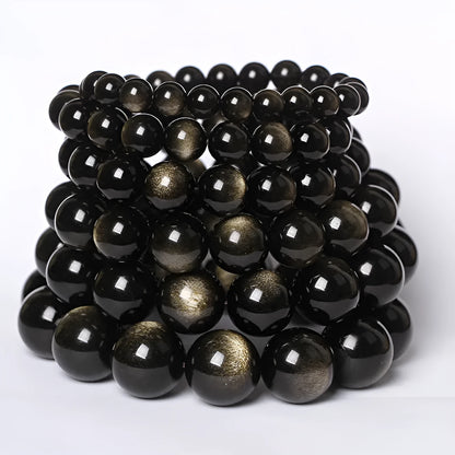 Hand-woven obsidian crystal bracelet showing round beads with ethnic styling in multiple colour options