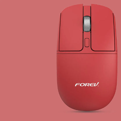 Compact wireless Bluetooth mouse with wireless charging, shown in grey colour on a desk.