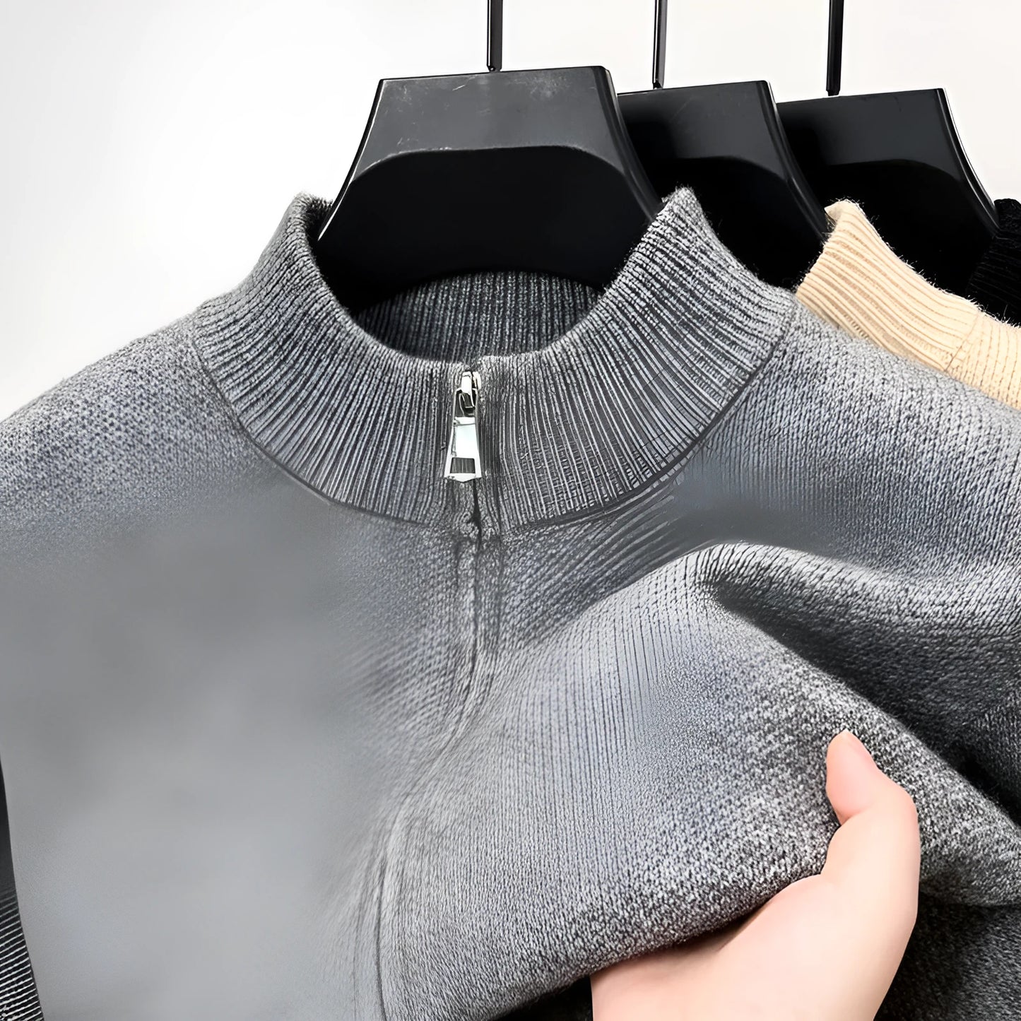 Men's grey knitted zip cardigan with stand collar showing loose fit and thickened fabric texture