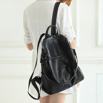 Genuine leather women's retro backpack in large capacity with waterproof construction and internal compartments