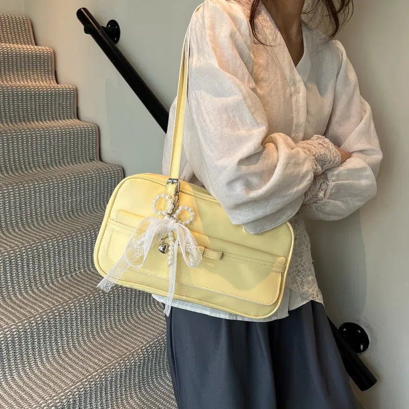 PU single shoulder bag with mobile phone compartment in horizontal square shape with optional pearl bow ornaments