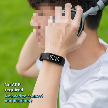 Smart electronic watch with vibration alarm on a silicone strap, showing LED display and 11mm thick case.