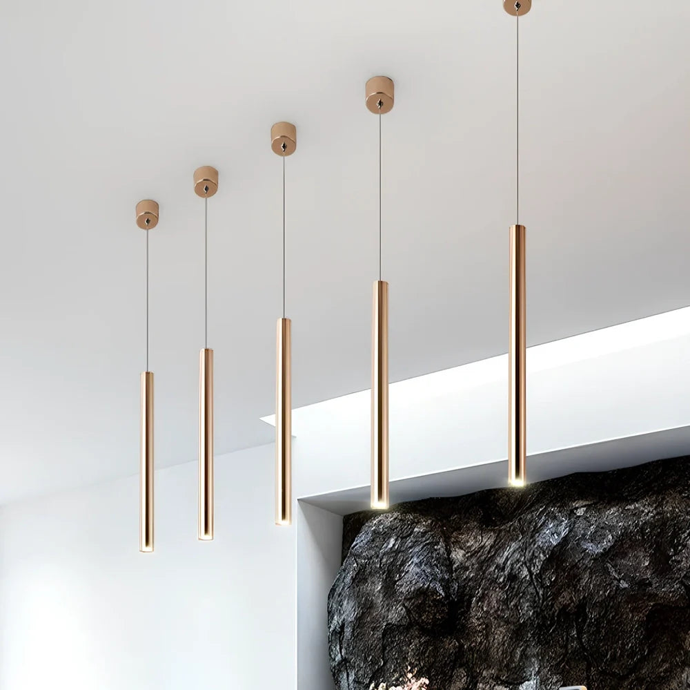 Gold cylindrical chandelier with iron construction and PMMA lampshade in multiple size options from 3.2x30cm to 6x80cm