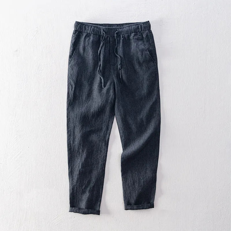 Men's straight linen trousers in four colour options showing mid waist and straight-leg cut