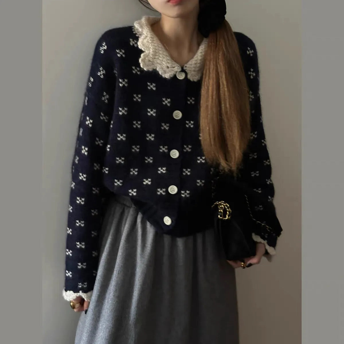 Women's floral pattern knit cardigan with Peter Pan collar in navy blue colour