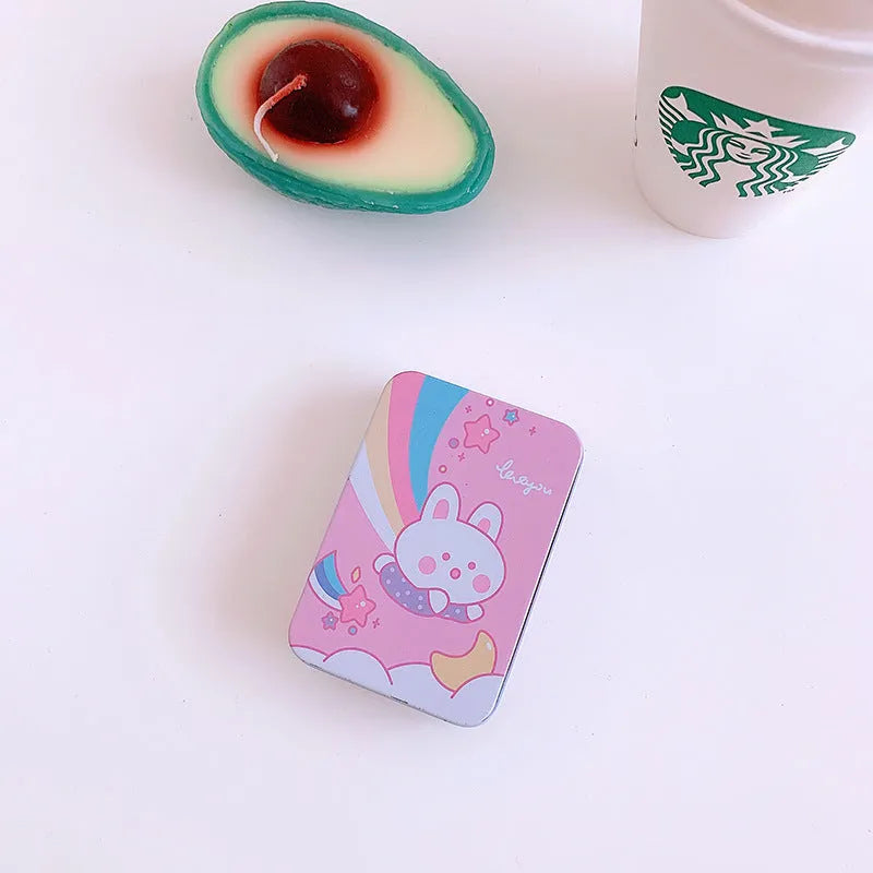 Small white iron storage box with a printed apple girl design on the lid.