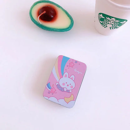 Small white iron storage box with a printed apple girl design on the lid.