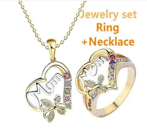 A shimmering heart-shaped jewelry set with a multicolor rhinestone design, including a ring and coordinating necklace, a thoughtful Mother's Day gift.