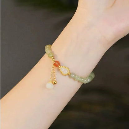 Qingshui jade women's bracelet with gold gourd charm and fu character, 6mm gold plated beads
