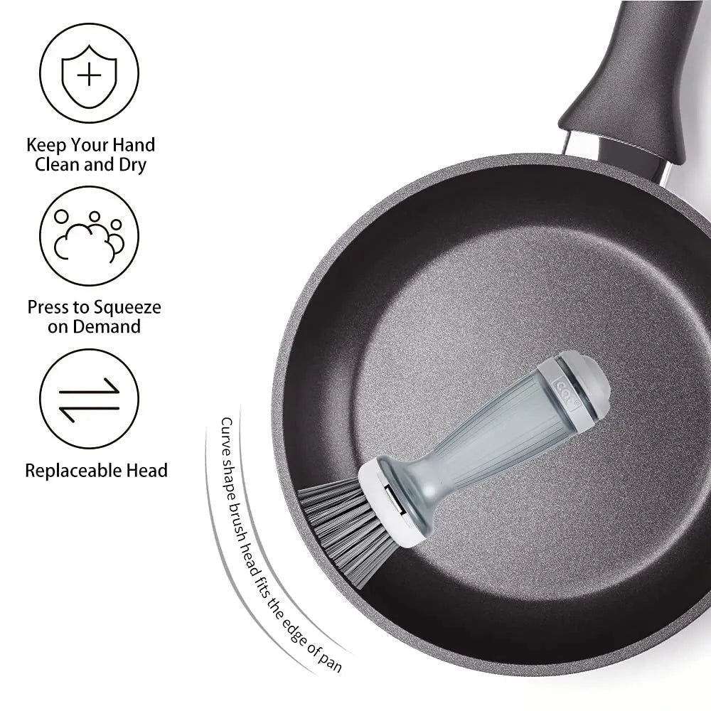 Milk white and mint green pot scrub brush with a soap dispenser handle and replaceable non-scratch bristles.
