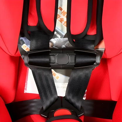 Black nylon vehicle child safety seat five-point harness chest clip and buckle on a white background.
