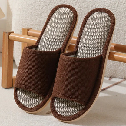 Women's open-toe linen slippers with thick sole in light brown colour.