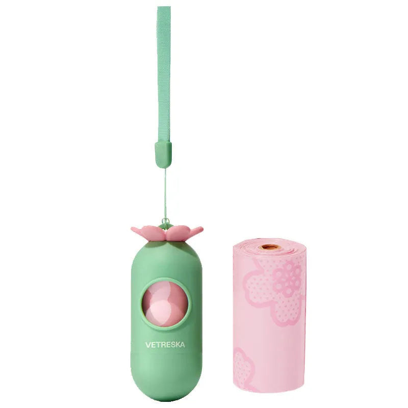 Dog poo bag dispenser capsule with roll of scented waste bags in strawberry, orange, or cherry blossom options
