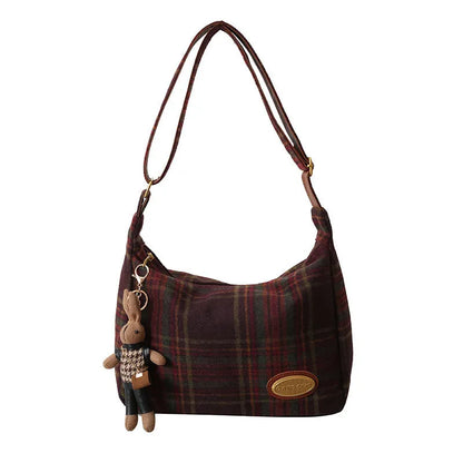 Women's large capacity woolen shoulder bag in brown with pendant attachment for autumn and winter use