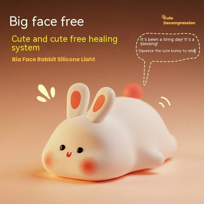 Adorable LED night light with soft silicone design and rabbit face, perfect for kids' bedrooms