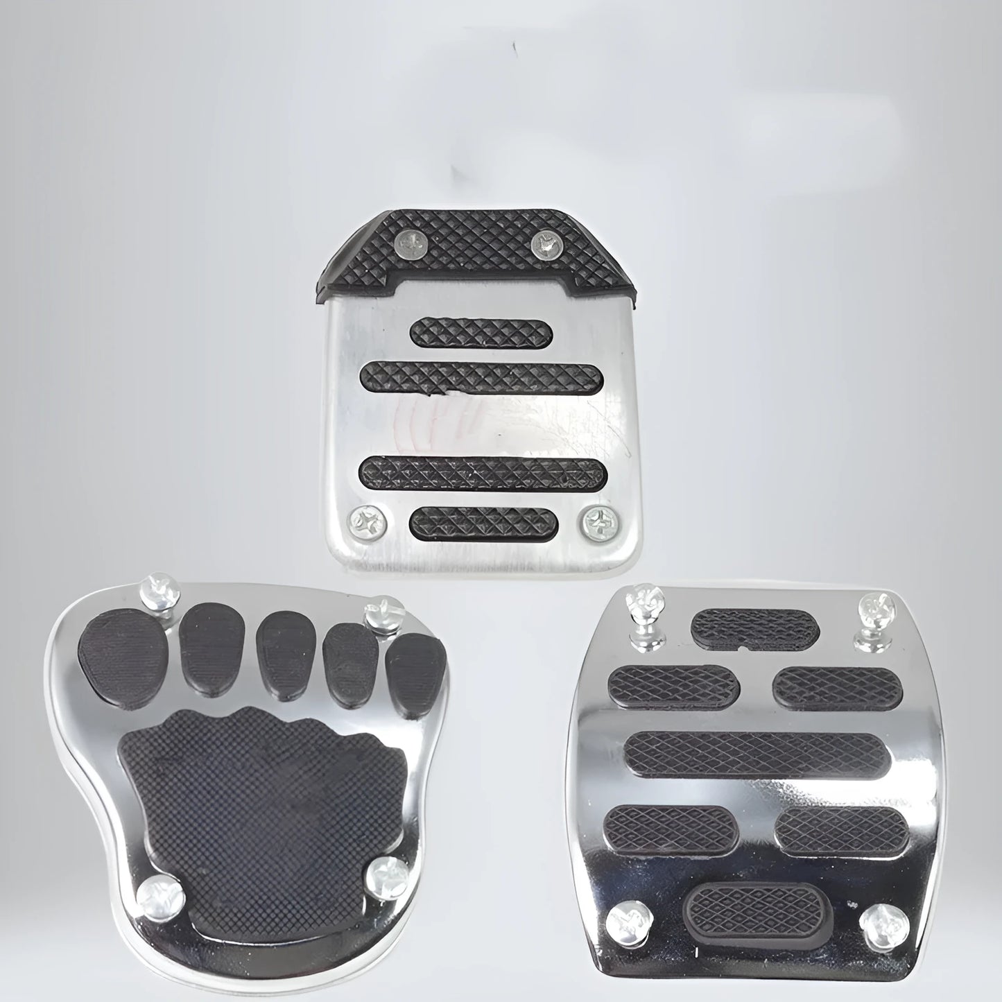 Metal motorcycle brake pedal skid plate showing three style options