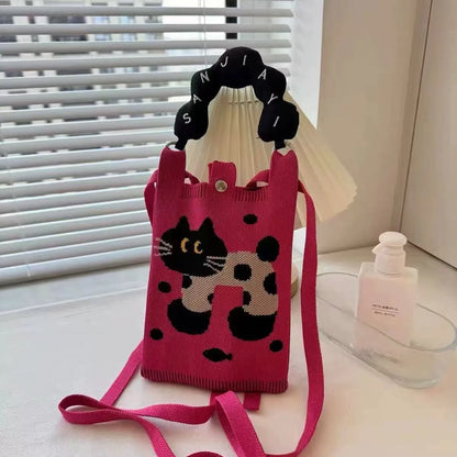 Cartoon knitted messenger bag with polyester construction and internal mobile phone storage