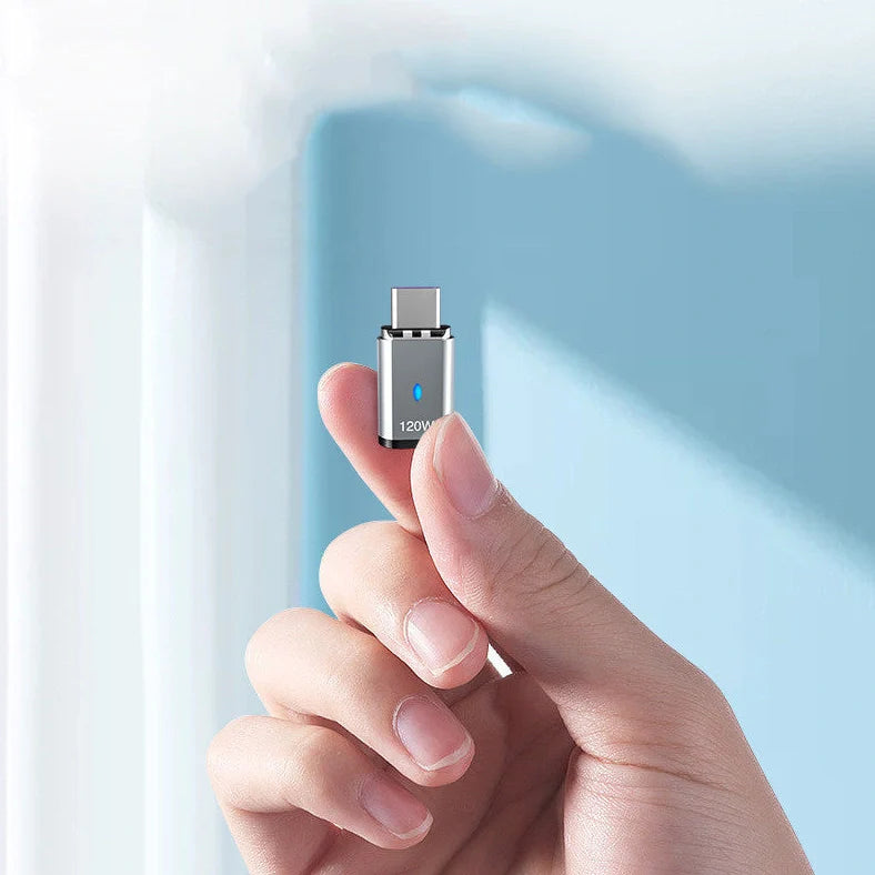 Dark grey magnetic charging adapter showing elbow connection design with multiple adapter heads for different device ports